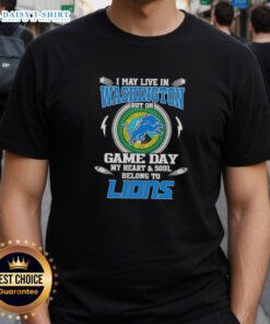 Alt Text: Detroit Lions T-shirt with 'I May Live In Washington But My Heart Belongs To Detroit Lions' slogan on display.
