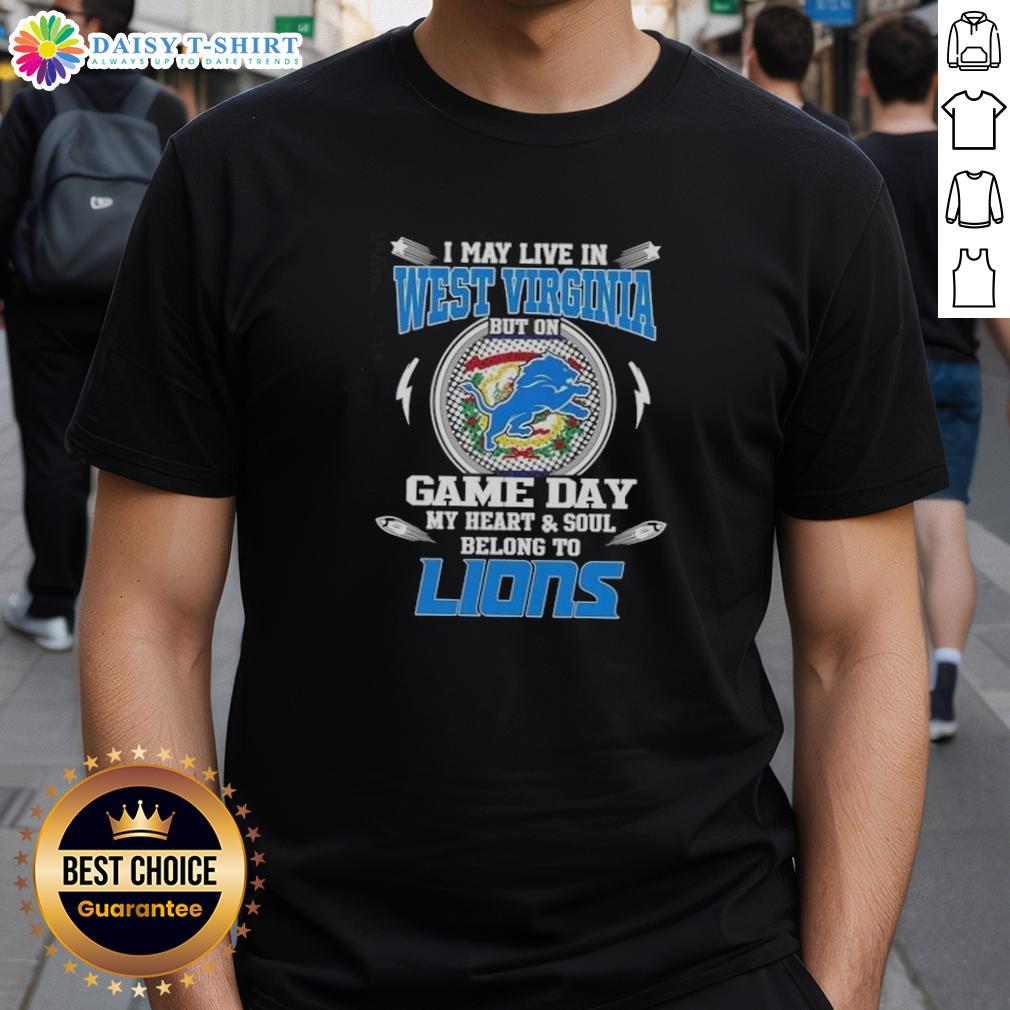 Nice I May Live In West Virginia But On Game Day My Heart And Soul Belongs To Detroit Lions T-Shirt Alt Text: Detroit Lions T-shirt design with 'I May Live In West Virginia But My Heart Belongs To Detroit Lions' slogan.