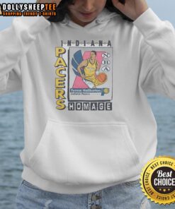 Alt Text: Tyrese Haliburton wearing a hoodie featuring a Nice Indiana Pacers trading card design, showcasing team spirit.