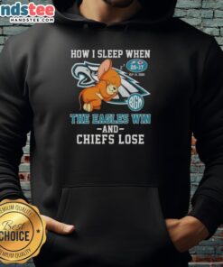 Alt Text: Cozy hoodie featuring 'How I Sleep When The Eagles Win and Chiefs Lose' design, perfect for NFL fans.
