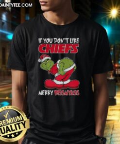 Funny Kansas City Chiefs Grinch Christmas T-shirt: 'If You Don't Like Chiefs, Merry Krissmyass' design for festive fans.