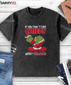 Alt Text: Funny Christmas washed t-shirt featuring Grinch design for Kansas City Chiefs fans Merry Krissmyass slogan.