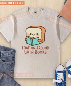 Casual washed t-shirt featuring a fun design of loafing around with books, perfect for book lovers and relaxed outings.