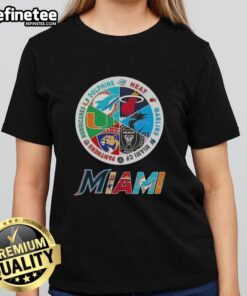 Ladies tee featuring logos of Miami sports teams: Dolphins, Heat, Marlins, Miami FC, Panthers, and Hurricanes.