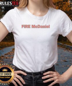 Stylish Miami Dolphins tee for women featuring 'Fire Mike McDaniel' design, perfect for fans supporting the team.