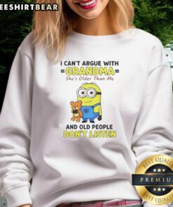 Funny Nice Minion sweatshirt featuring 'I can't argue with grandma, she's older' text, perfect for family gatherings.