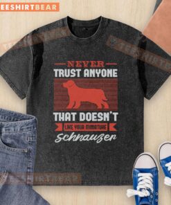 Funny washed t-shirt featuring 'Never Trust Anyone That Doesn't Like Your Miniature Schnauzer' design.