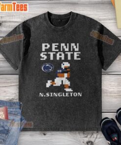 Alt Text: Nicholas Singleton wearing a retro Penn State Nittany Lions football washed t-shirt, showcasing team spirit.