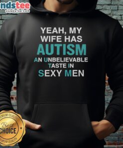 Alt Text: Man wearing 'My Wife Has Autism' hoodie, showcasing stylish design and humor about autism and relationships.
