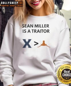 Alt Text: 2025 sweatshirt featuring 'Nice Sean Miller Is A Traitor' for Xavier Musketeers fans, contrasting Texas Longhorns basketball.