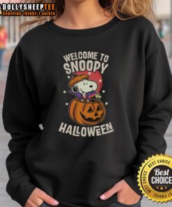 Cozy Snoopy Halloween sweatshirt featuring colorful Snoopy and Halloween-themed designs for a festive look.