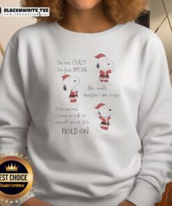 Cute Snoopy Christmas sweatshirt with 'I'm Not Crazy, I'm Just Special' text, perfect for festive holiday wear.
