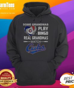 Grandmas wearing Chicago Cubs baseball hoodies enjoy bingo night, showcasing love for baseball and family fun.