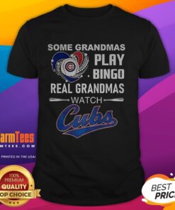 Grandma wearing 'Real Grandmas Watch Chicago Cubs Baseball' T-shirt, enjoying bingo at a baseball game.