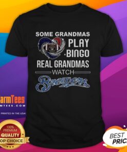 Grandmas enjoying a Milwaukee Brewers baseball game, wearing a fun 'Real Grandmas Watch Baseball' T-shirt.