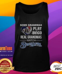 Grandmas enjoying Milwaukee Brewers baseball in heart tank tops, showcasing fun and love for the game.