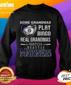 Grandmas in Seattle Mariners baseball sweatshirts enjoying a game, showcasing love for baseball and family fun.