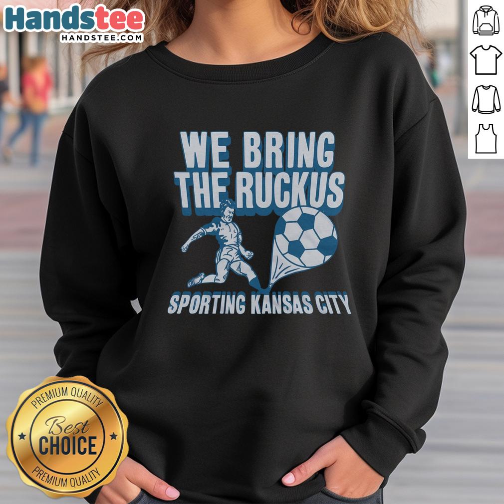 nice-sporting-kansas-city-we-bring-the-ruckus-sweatshirt Alt Text: Nice Sporting Kansas City We Bring The Ruckus sweatshirt in blue, perfect for fans showing team spirit.
