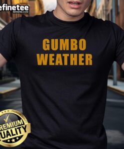 Alt Text: Nice T-Bob Hebert wearing a Gumbo Weather T-Shirt, showcasing vibrant design and casual style.
