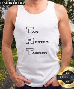 Stylish tan 'Rested Tarded' tank top displayed on a wooden background, perfect for casual summer outfits.