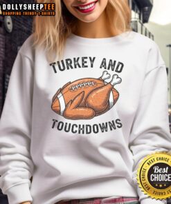 Alt Text: Cozy Thanksgiving football fan sweatshirt featuring a turkey and touchdowns design for festive game day celebrations.