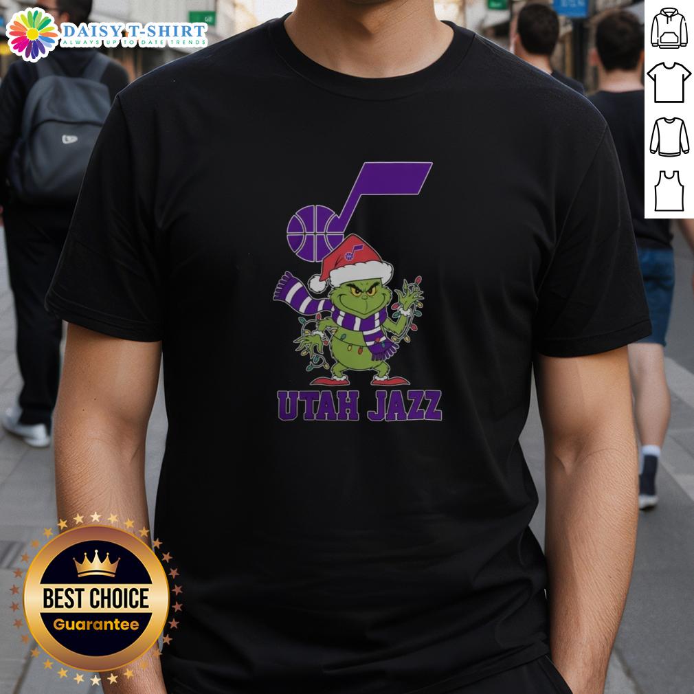 Nice Utah Jazz Christmas Grinch Santa Hat Holiday 2025 T Shirt Alt Text: Utah Jazz Christmas Grinch Santa Hat Holiday 2025 T-Shirt featuring festive graphics and team colors for basketball fans.