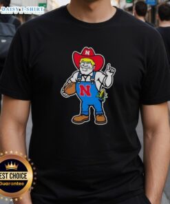 Andrew Whitworth and Ryan Fitzpatrick in Nebraska Huskers Herbie mascot t-shirt, showcasing team spirit and camaraderie.