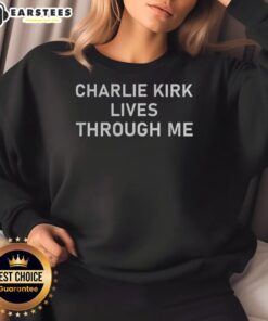 Official Charlie Kirk Lives Through Me Memorial Sweatshirt featuring bold graphics and a comfortable design.