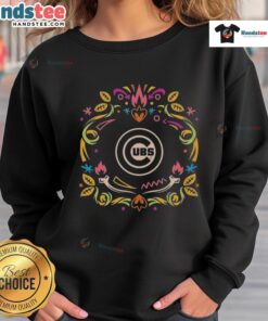 Official Chicago Cubs Da de los Muertos MLB celebration sweatshirt featuring vibrant colors and festive design.
