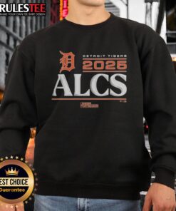 Alt Text: Official Detroit Tigers 2025 Division Series Winner locker room sweatshirt displayed on a hanger, showcasing team pride.