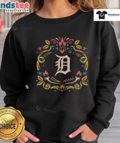 Alt Text: Official Detroit Tigers Dia de los Muertos MLB Celebration Sweatshirt featuring vibrant colors and festive designs.