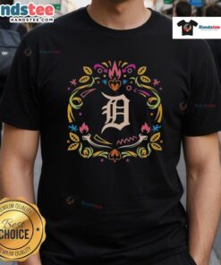 Alt Text: Official Detroit Tigers Da De Los Muertos MLB celebration t-shirt featuring vibrant designs and team logo.