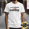Official Everybody Hates Cathy T-Shirt featuring bold graphic design and vibrant colors, perfect for fans of the show.