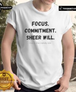 Official Focus Commitment Sheer Will Me In The Candy Isle T-Shirt displayed on a hanger, showcasing vibrant colors and unique design.