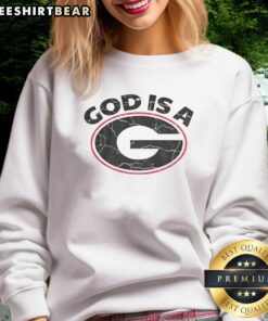 Alt Text: Official God Is A G Georgia Bulldogs Sweatshirt featuring team colors and logo, perfect for fans and game day apparel.