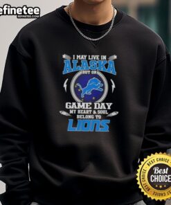 Cozy sweatshirt featuring 'I May Live In Alaska But On Game Day My Heart Belongs To Detroit Lions' design.