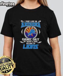 Official I May Live in Arizona But On Game Day My Heart Belongs to Detroit Lions Ladies Tee in vibrant colors.
