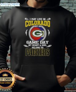 Alt Text: Green Bay Packers hoodie with text I May Live In Colorado But On Game Day My Heart Belongs To Green Bay Packers.