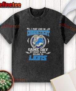 Alt Text: Detroit Lions washed t-shirt with 'I May Live In Connecticut But On Game Day My Heart Belongs To Detroit Lions' print.