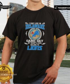 Alt Text: Official I May Live In Delaware But On Game Day My Heart And Soul Belongs To Detroit Lions T-Shirt design.