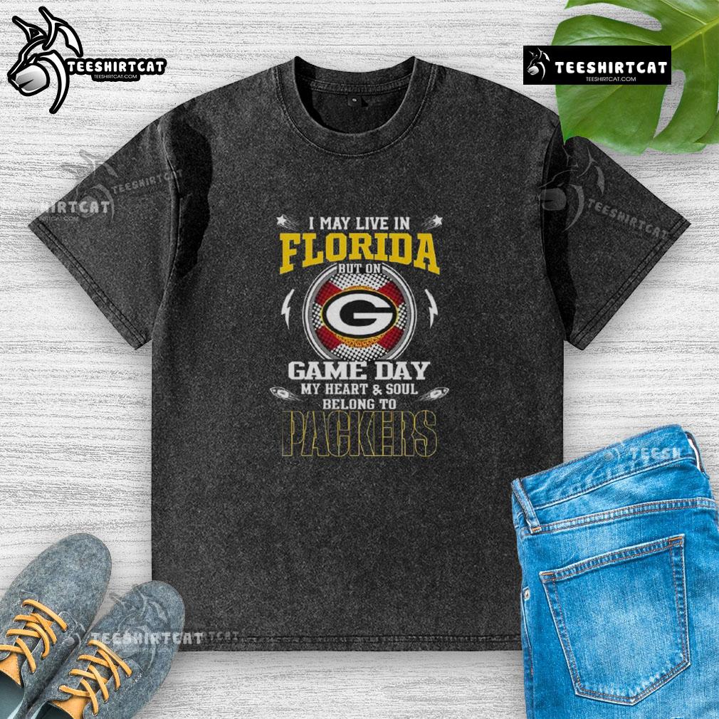 Official I May Live In Florida But On Game Day My Heart And Soul Belongs To Green Bay Packers Washed T-Shirt Official Green Bay Packers washed t-shirt, perfect for fans in Florida on game day, showcasing team pride and style.