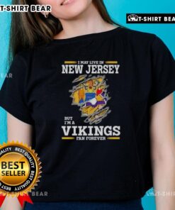 Official I May Live in New Jersey But I'm A Minnesota Vikings Fan Forever Ladies Tee design featuring team colors and logo.