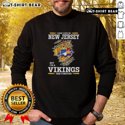 Cozy sweatshirt with 'I May Live In New Jersey But I'm A Minnesota Vikings Fan Forever' design for dedicated fans.