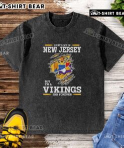 Official I May Live In New Jersey But I'm A Minnesota Vikings Fan Forever washed t-shirt design featuring team colors.