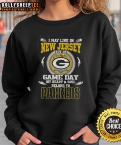 Alt Text: Green Bay Packers sweatshirt with I May Live In New Jersey But On Game Day My Heart Belongs To text design.