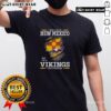 Alt Text: Official I May Live In New Mexico But I'm A Minnesota Vikings Fan Forever T-Shirt featuring team colors and logo.