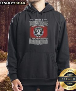 Alt Text: Official I May Live In Tennessee But On Gameday My Heart And Soul Belongs To Raiders Hoodie in black and silver.