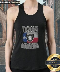 Stylish tank top featuring 'I May Live In Texas But On Gameday My Heart And Soul Belongs To Raiders' for football fans.
