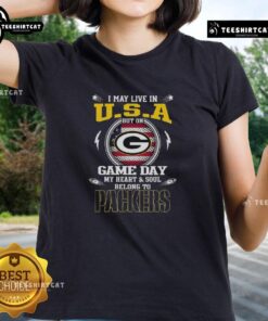 Green Bay Packers ladies tee with 'I may live in U.S.A. but on game day my heart belongs to Packers' design.