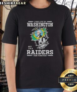 Official 'I May Live in Washington But I'm a Raiders Fan Forever' ladies tee showcasing team spirit and style.
